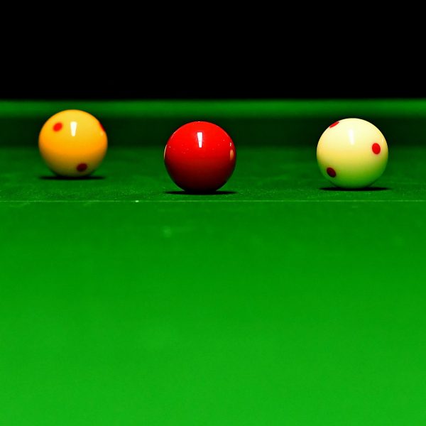 Three billiards balls