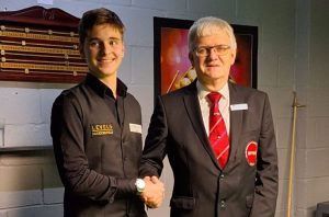 Vladislav Gradinari shakes hands with tournament director Graham Mason.