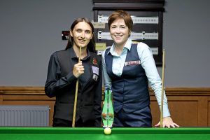 Jamie Hunter and Mary Talbot-Deegan either side of the trophy.